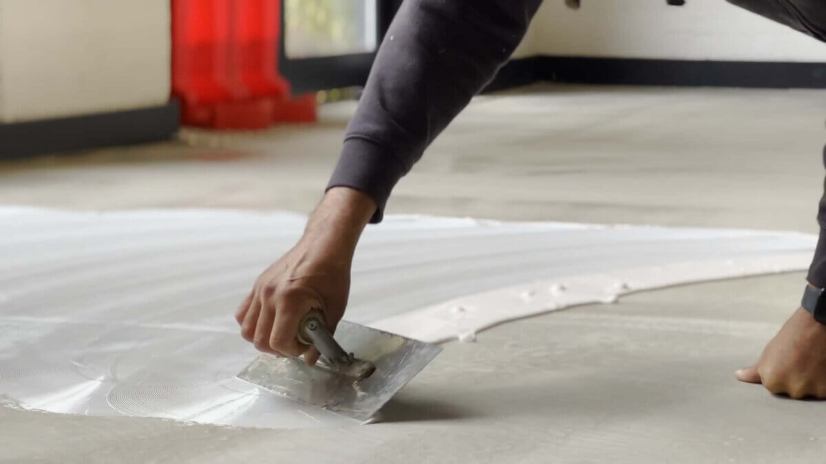 Laying adhesive at the Gate House in Digbeth