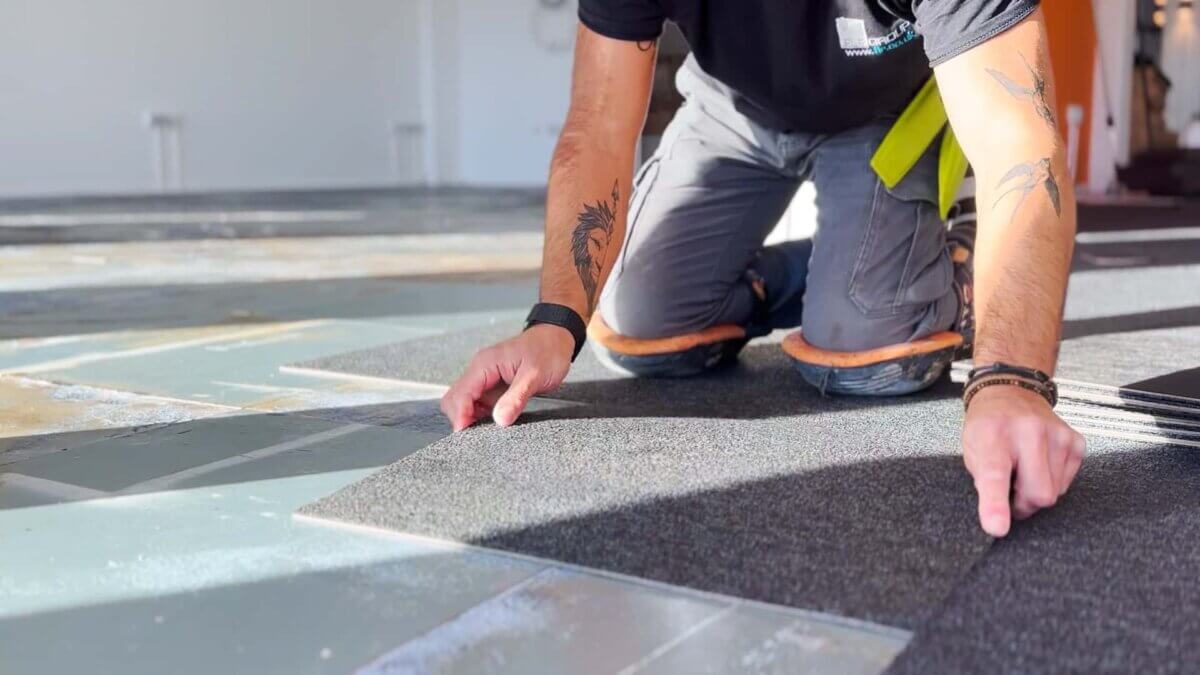 Laying new carpet tiles at ITG