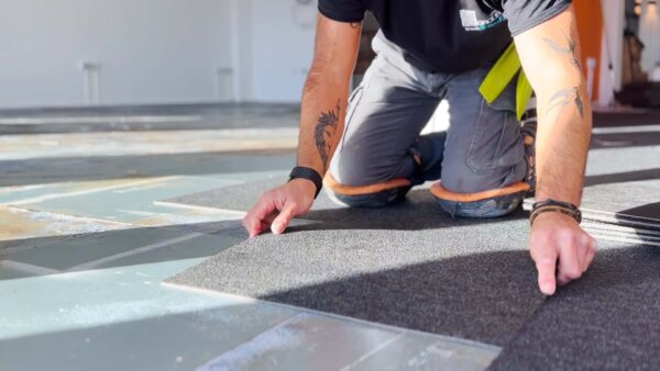 Laying new carpet tiles at ITG