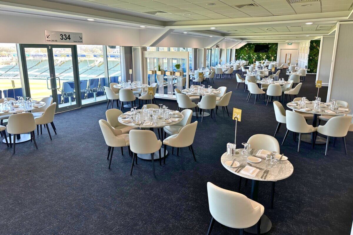 An interior of Edgbaston Cricket ground that showcases dark grey Milliken carpet tiles